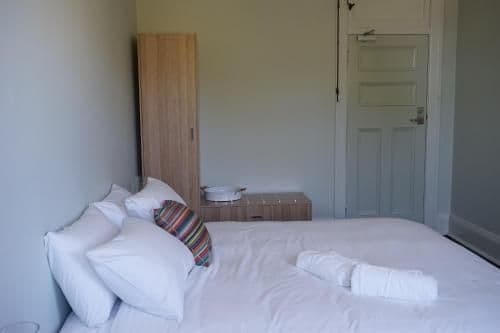 Deluxe King Room with Shared Bathroom
