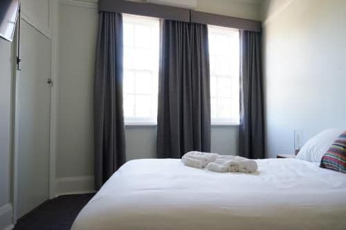 Deluxe King Room with Shared Bathroom