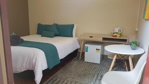 Queen Room with Shared Bathroom