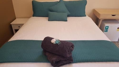 Queen Room with Shared Bathroom
