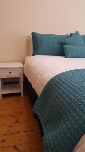 Queen Room with Shared Bathroom