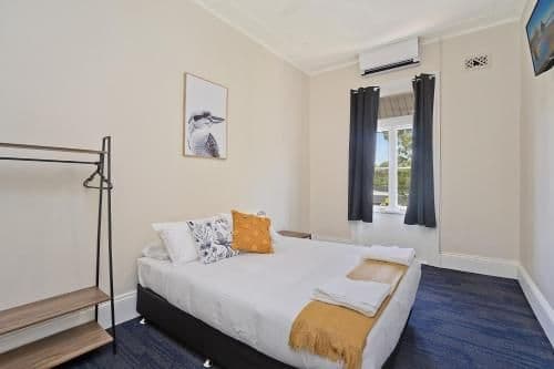 Queen Room with Shared Bathroom