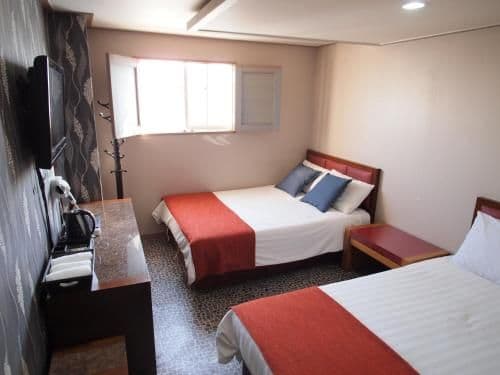 Quadruple Room with Private Bathroom