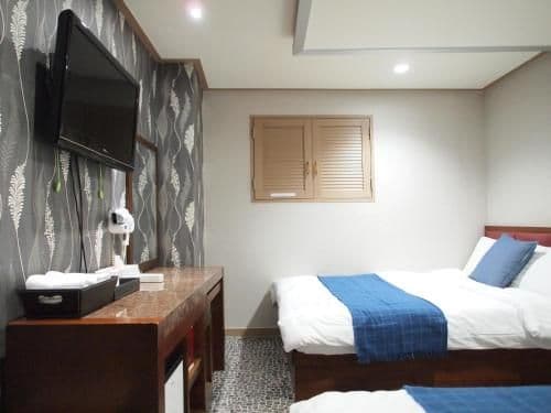 Quadruple Room with Private Bathroom