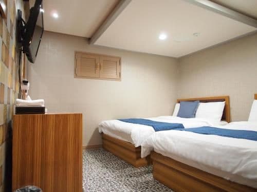 Quadruple Room with Private Bathroom