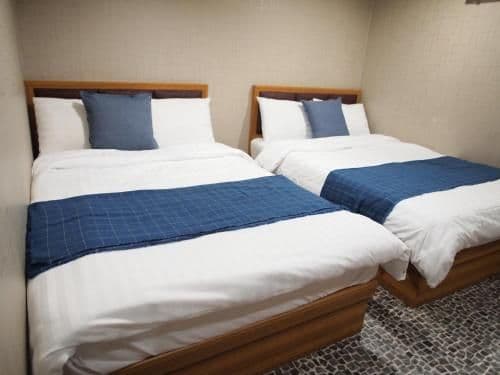 Quadruple Room with Private Bathroom