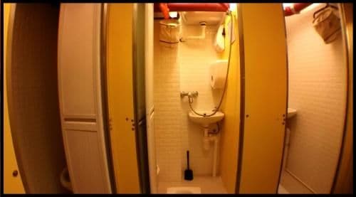 Twin Bunk Beds Room with Shared Bathroom