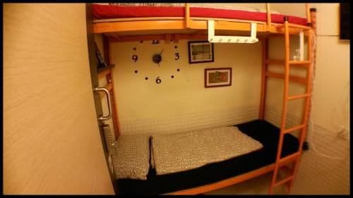 Twin Bunk Beds Room with Shared Bathroom