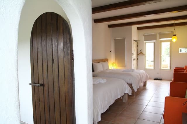 Deluxe Quadruple Room, 2 Queen Beds, Bathtub, Ocean View