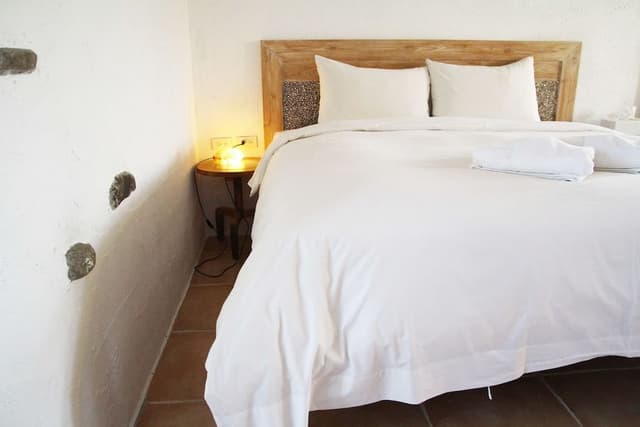 Deluxe Quadruple Room, 2 Queen Beds, Bathtub, Ocean View