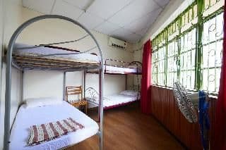 Bed in dormitory WITH SHARED BATHROOM