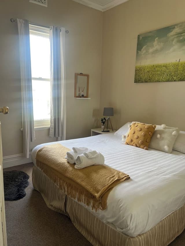 Basic Double Room, 1 Queen Bed, Shared Bathroom