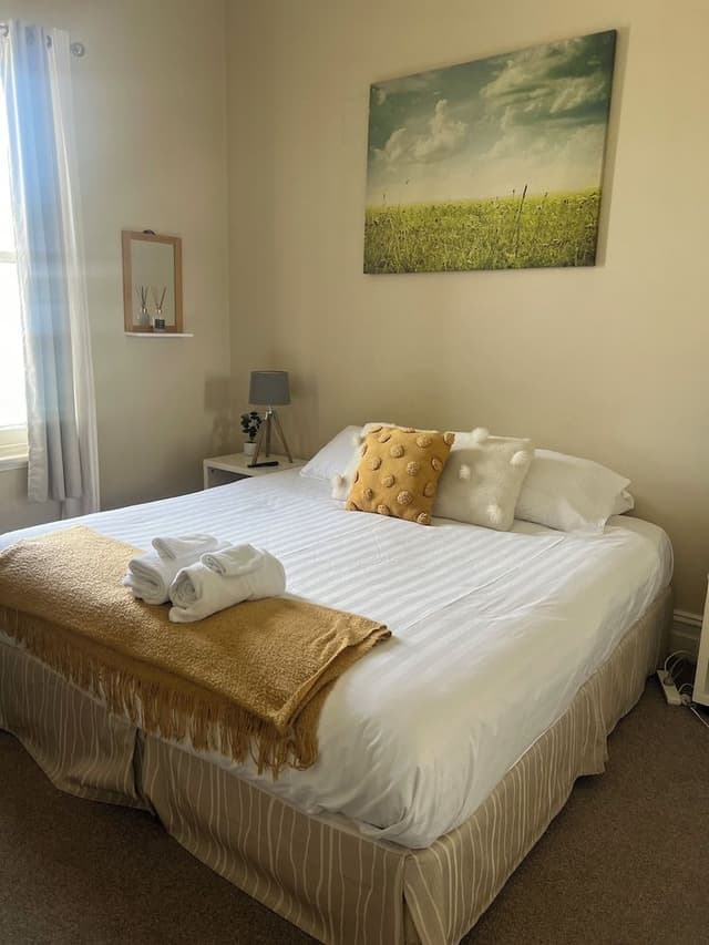 Basic Double Room, 1 Queen Bed, Shared Bathroom