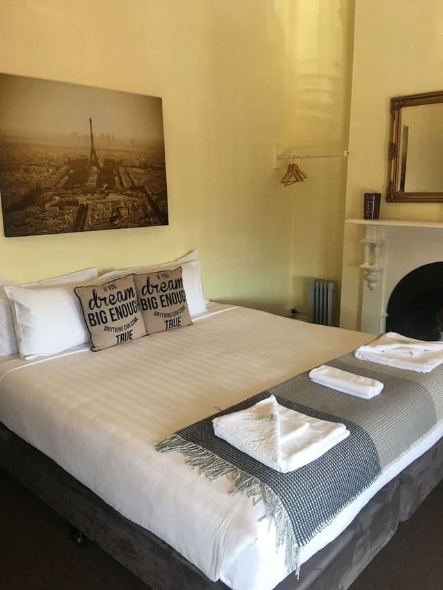 Basic Double Room, 1 Queen Bed, Shared Bathroom