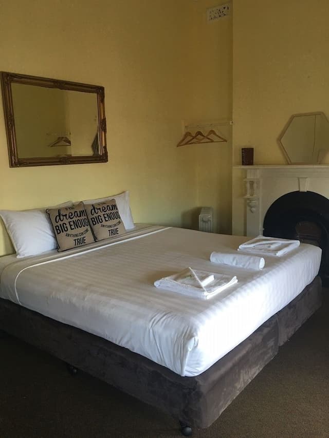 Basic Double Room, 1 Queen Bed, Shared Bathroom