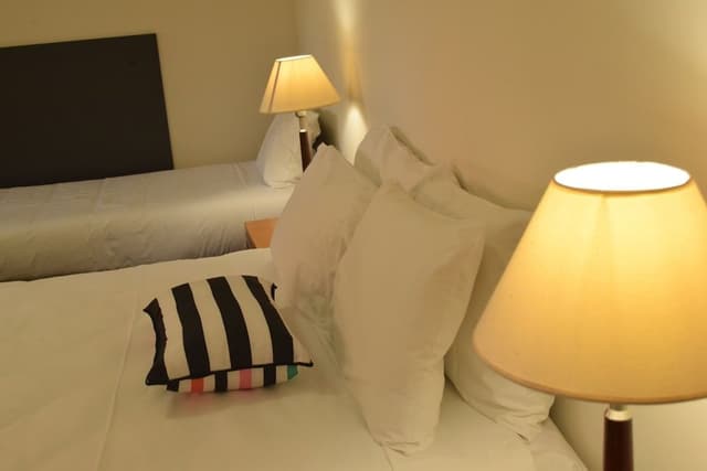 Queen Bed plus Single Bed Room