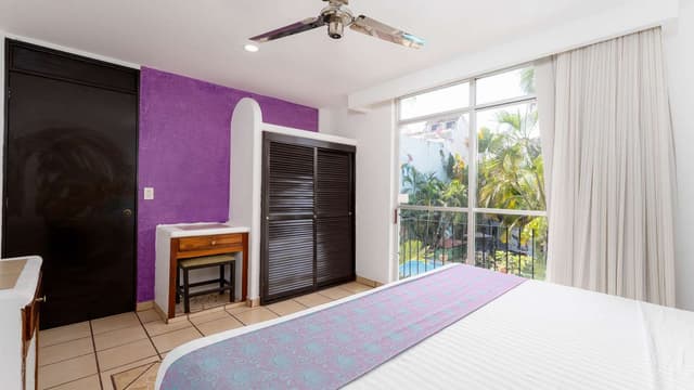 Suite - 1 King 2 Double Beds, Non-Smoking, Sofabed, Flat Screen Television, Living Room, Dining Room, Kitchenette