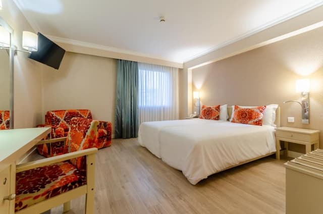 Double or Twin Room (2 Adults + 1 Child)