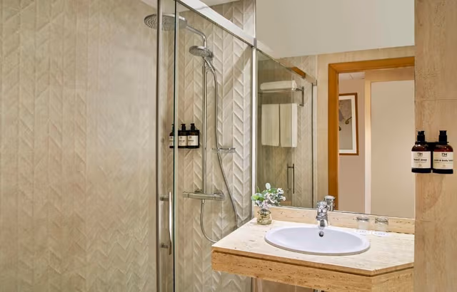 Family Adjoining Room (3 Adults + 1 Child)