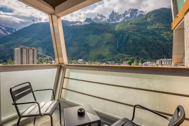 Superior Room with sofa and balcony – Mont-Blanc Range view