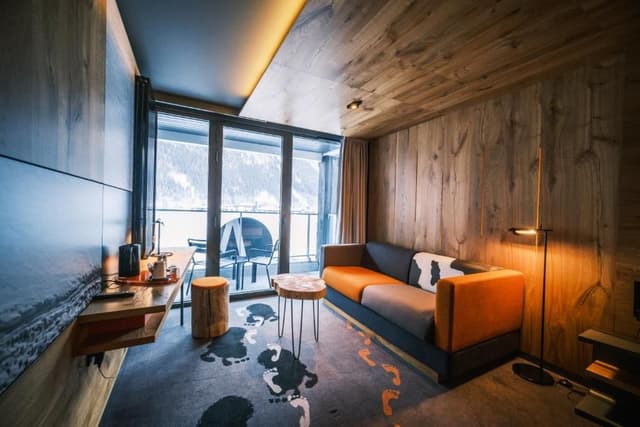 Superior Room with sofa and balcony – Mont-Blanc Range view