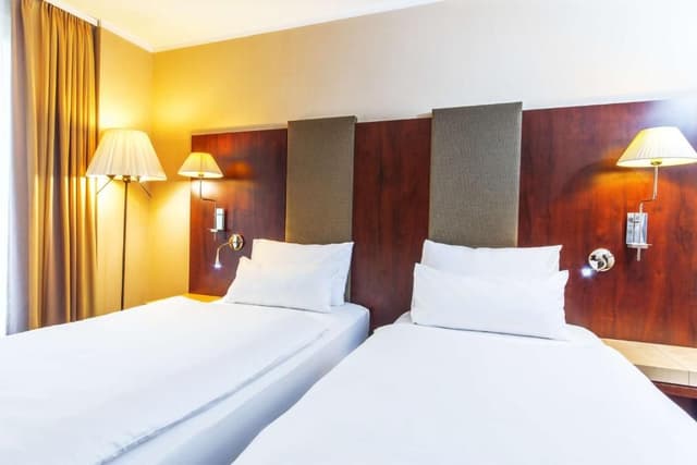 Standard Room with extra bed (2 adults + 1 child)