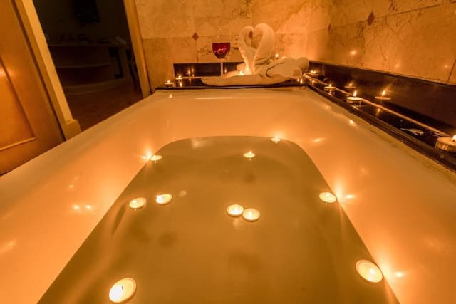 Suite with Separate Living Area and Bathtub