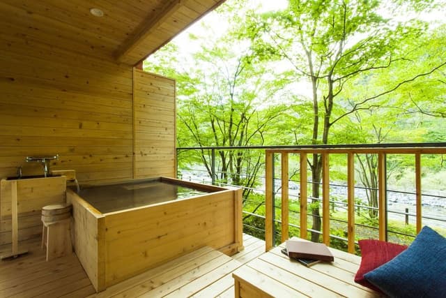 Outdoor bath with mountain stream side tatami room