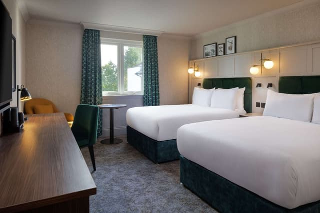 TWO DOUBLE BEDS DELUXE ROOM WITH GOLF VIEW