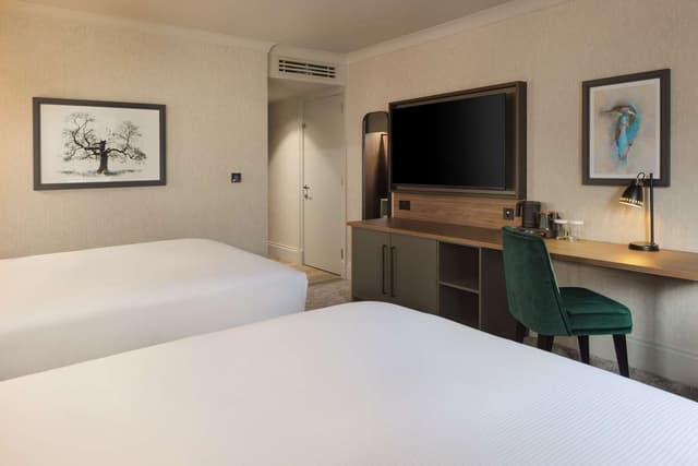 TWO DOUBLE BEDS DELUXE ROOM WITH GOLF VIEW
