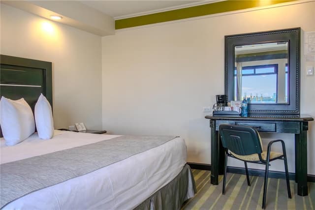 1 King Bed, Non Smoking Room, High Speed Internet Access, Coffee Maker, Iron And Ironing Board, Hairdryer, Continental Breakfast