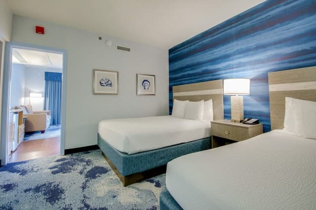 Suite South, 2 Queen Beds & Sofa Bed, Limited View, Balcony