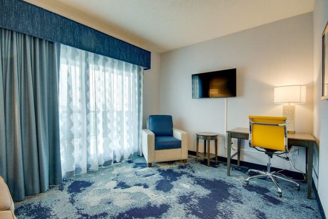 Suite South, 2 Queen Beds & Sofa Bed, Limited View, Balcony