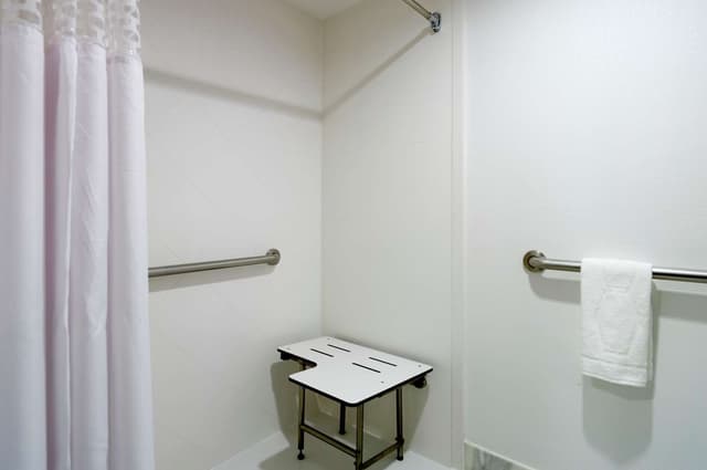 1 KING MOBILITY ACCESSIBLE W/ROLL IN SHOWER