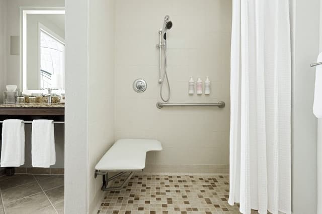 The Grand Den Mobility-Accessible Suite with Roll-In Shower