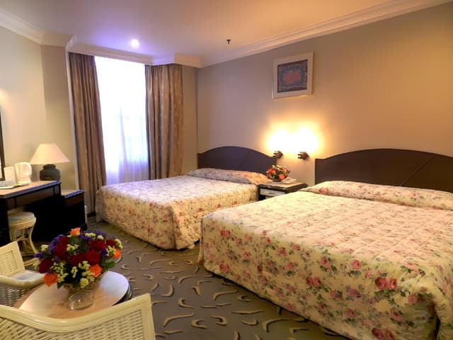 Deluxe Quadruple Room with Queen Bed and 2 Single Beds