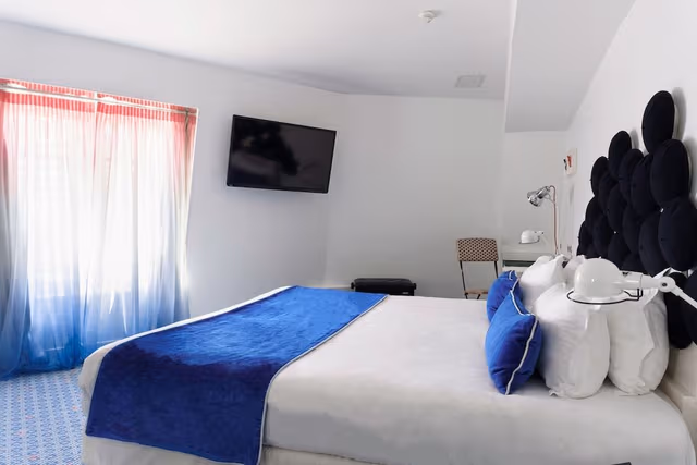 Family Room, 2 Bedrooms, includes soft minibar, courtesy tray, digital press