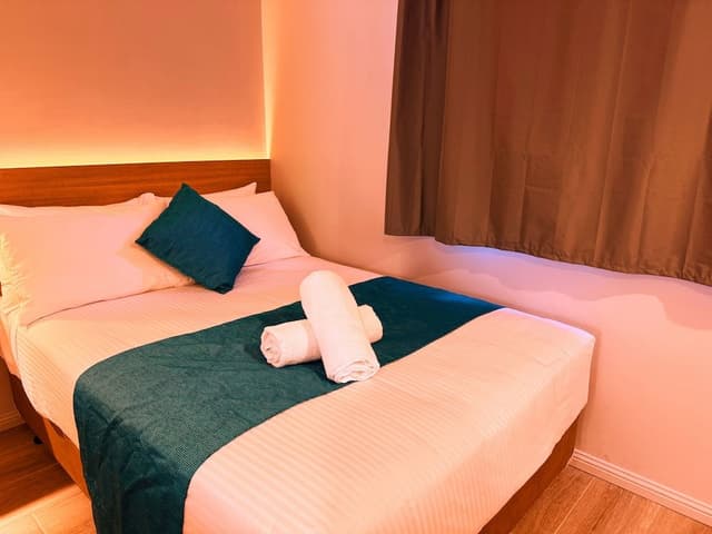 Deluxe Queen + Double Room