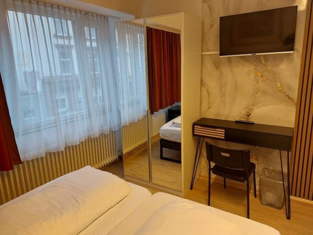 Quadruple Room, City View