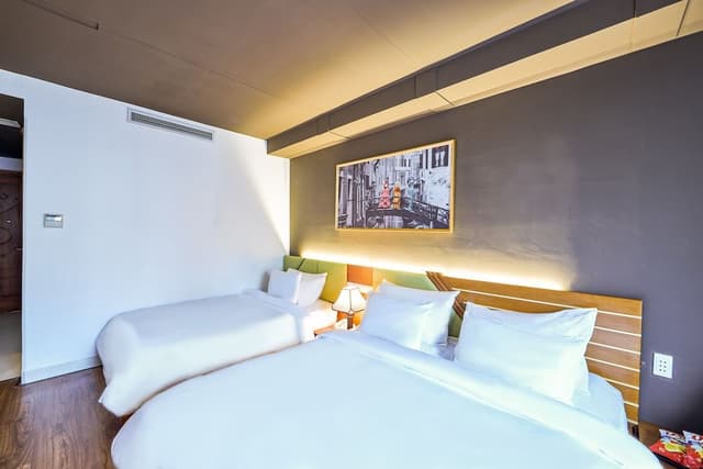 Deluxe Triple Room with complimentary daily snack