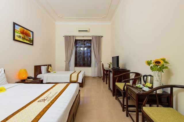 Deluxe Triple Room