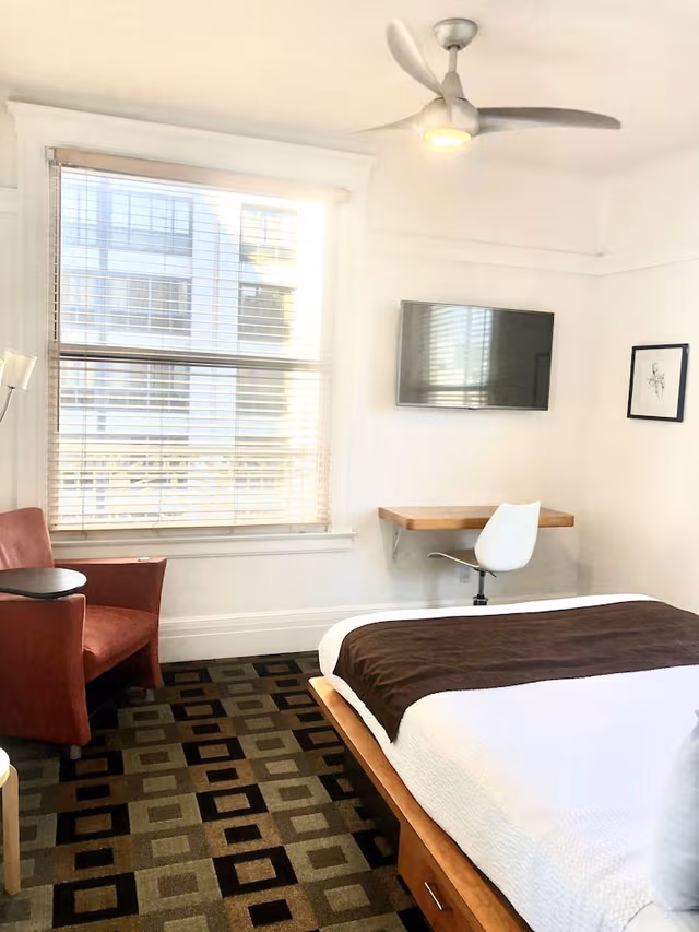 Shared Bathroom in Hallway, One Queen Bed