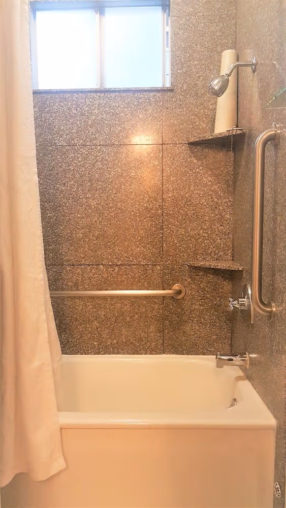 Shared Bathroom in Hallway, One Queen Bed