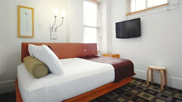 Shared Bathroom in Hallway, One Queen Bed