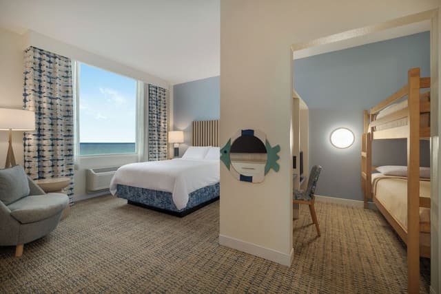 Suite, Multiple Beds, Pool View