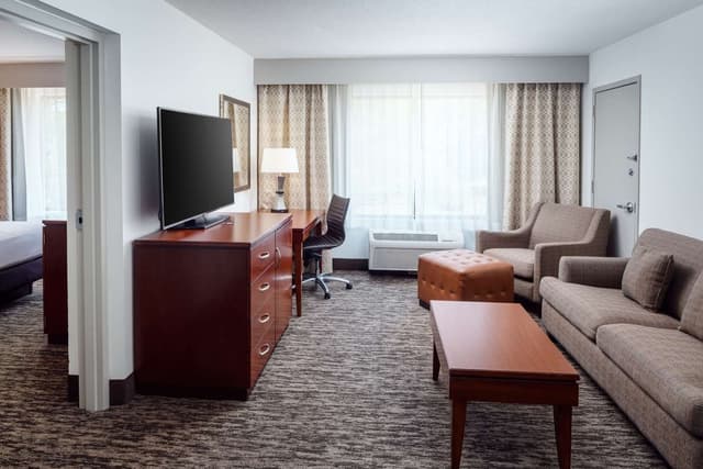 1 QUEEN BED 2 ROOM SUITE WITH SOFA BED