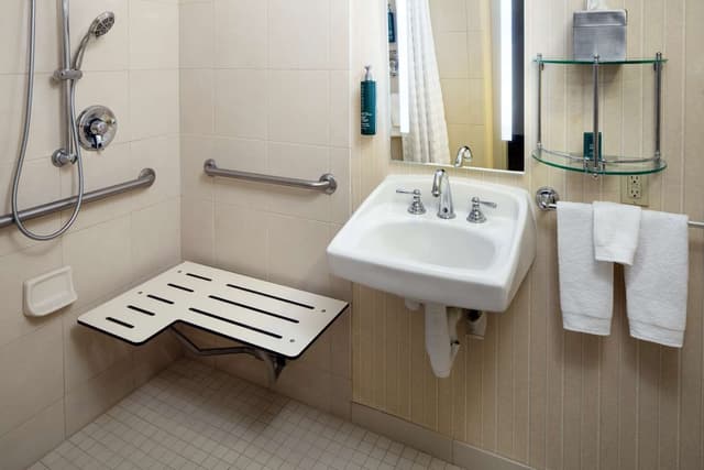 1 QUEEN ROOM ACCESSIBLE ROLL IN SHOWER