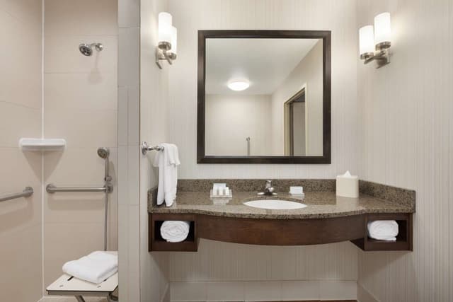 1 KING MOBILITY ACCESSIBLE W/ROLL IN SHOWER