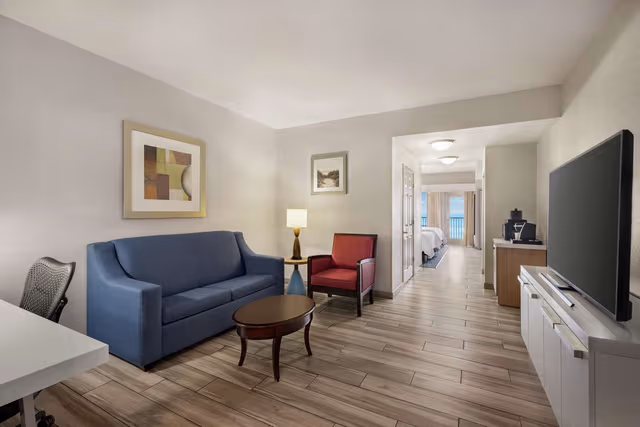 2 QUEEN BEDS JUNIOR SUITE PARTIAL OCEAN VIEW