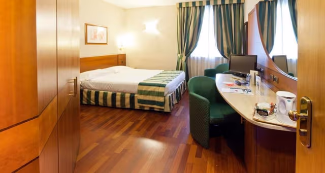 Quadruple Room with 1 King and 2 Single Beds